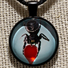 Spider Cider - 1" Pendant w/ Black Necklace